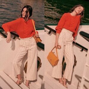Sezane Red Sweater and Cream Striped Trousers